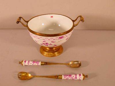 two spoons and a bowl on a table
