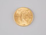 an image of a gold coin on a white surface