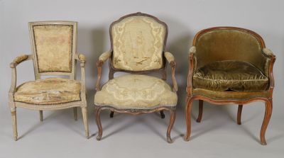 three antique chairs are lined up against a white background