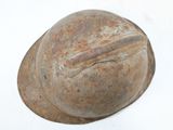 a helmet that is sitting on a white surface