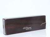 a close up of a box of chocolates on a white surface