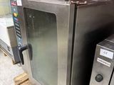 two ovens sitting on a pallet in a warehouse