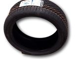 a close up of a tire on a white background
