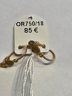 une photo d'un porte-clés auquel est accrochée une étiquette