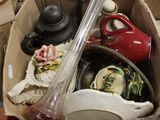 a box full of assorted items sitting on a table