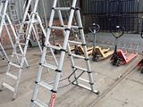 many ladders that are lined up in a warehouse