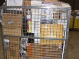 a large metal cart with boxes in it in a warehouse