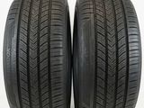 a pair of tires on a white background with the words vendu par lot de 2