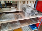 a shelf with many different items on it in a store