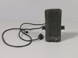 a small radio that is plugged into the wall