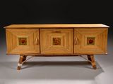 a wooden cabinet with three drawers and a door
