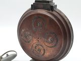 a lamp that is sitting on a stand with a cord