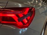 a close up of the tail lights of a car