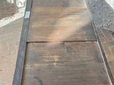 a wooden table with a drawer on top of it
