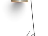 a close up of a lamp on a white surface with a spider on it