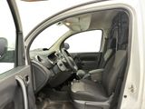 the interior of a car with the door open and the driver ' s seat down