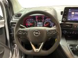 the interior of a car with a steering wheel, dashboard, and dash board