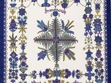 a blue and white table cloth with a floral design on it