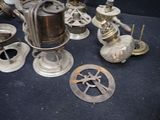 a lot of antique items that are sitting on a table
