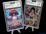 two cards on display in a plastic holder