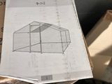 a piece of paper with a drawing of a house on it