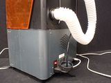 an image of a blow dryer with a hose attached to it