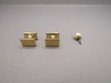 two pairs of gold plated cufflinks and a ball