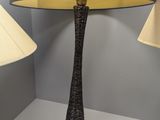 a lamp that is sitting on a table next to a lamp
