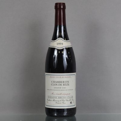 a bottle of wine that is sitting on a table