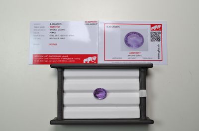 a picture of a box with a purple diamond on it