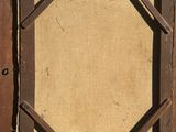 a picture of a wooden frame with a picture in it