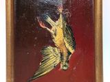 tableau représentant un oiseau suspendu à une corde accrochée à un mur
