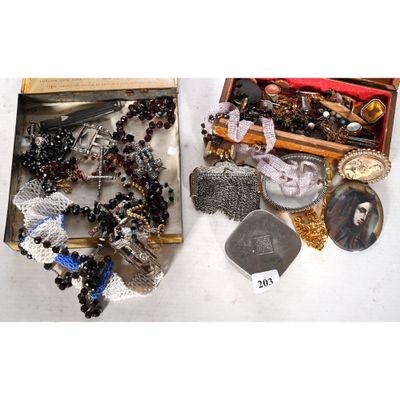 a box of jewelry and a picture of a woman