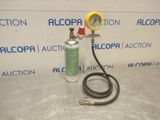 a close up of a hose and a pressurer on a table