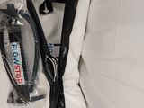 a bag with a toothbrush and a toothpaste in it