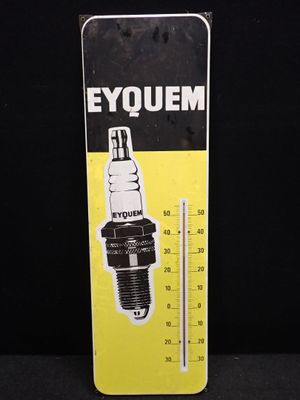 une image représentant un panneau jaune et noir sur lequel figure un thermomètre