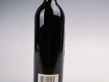 a bottle of wine that is sitting on a table