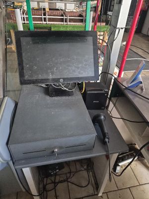 an image of a cash register machine in a store