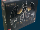 lego batman batmobile set in a box on a blue background