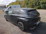 a black car that is parked in a lot