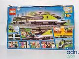 a box of lego city trains on display on the table