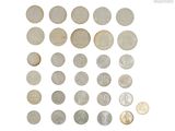 a lot of coins that are on the table