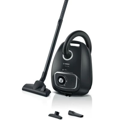 the vacuum is black and has a cord attached to it