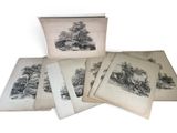five old books with drawings of trees on them on a white surface