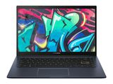 the laptop is open on a white surface with graffiti on the screen