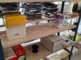 a shelf with many items on it in a store