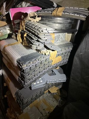 a pile of luggage sitting on top of a pile of boxes