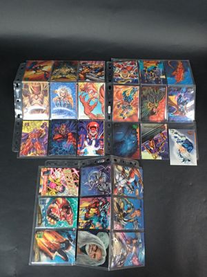 a bunch of comics on a table with a black background