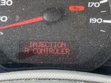 a close up of a speedometer in a car