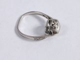 an image of a diamond ring on a white surface